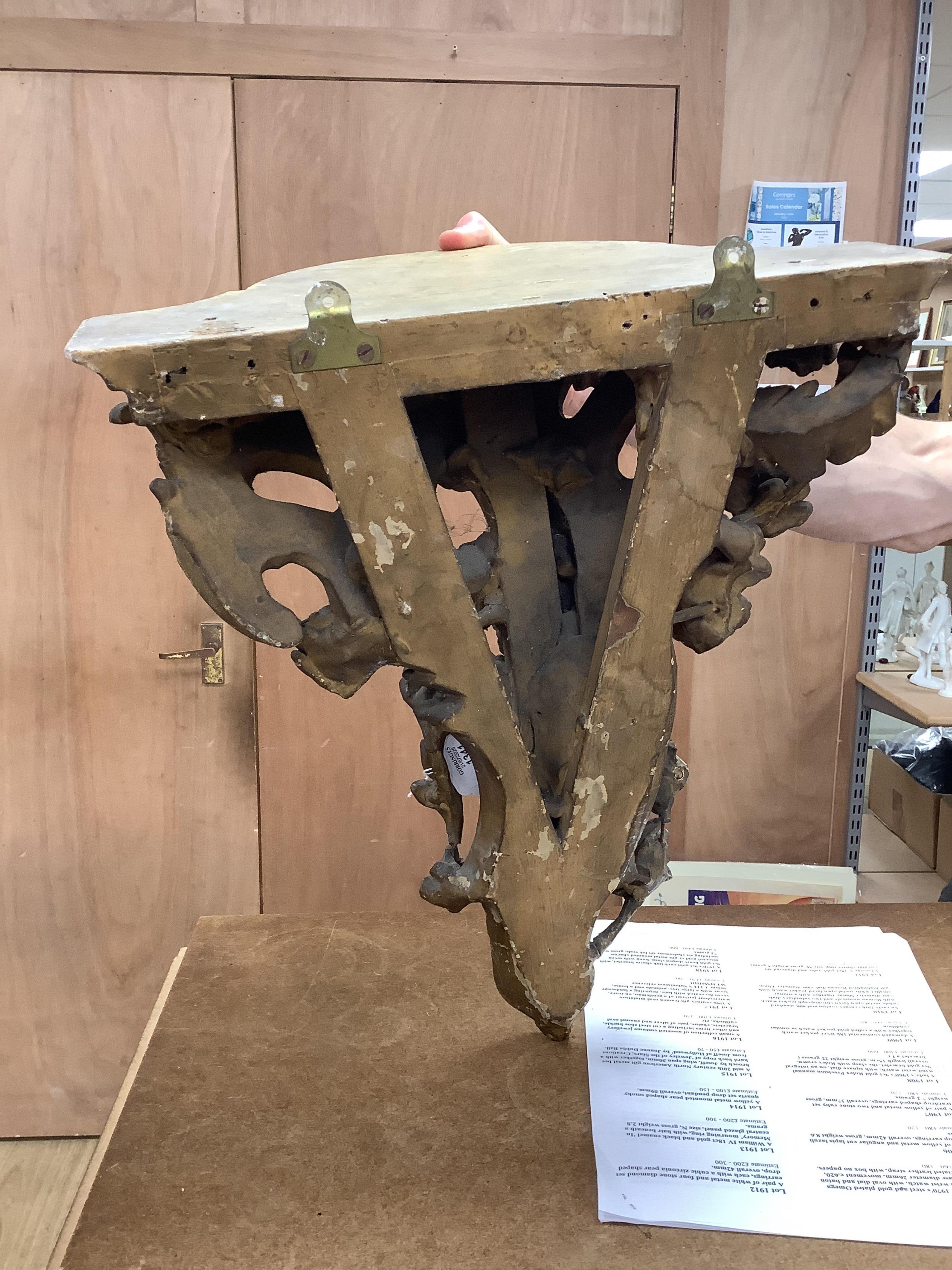 A Rococo style gilt wall bracket, 43cm high